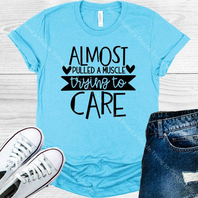 Almost Pulled A Muscle Trying To Care Graphic Tee Graphic Tee